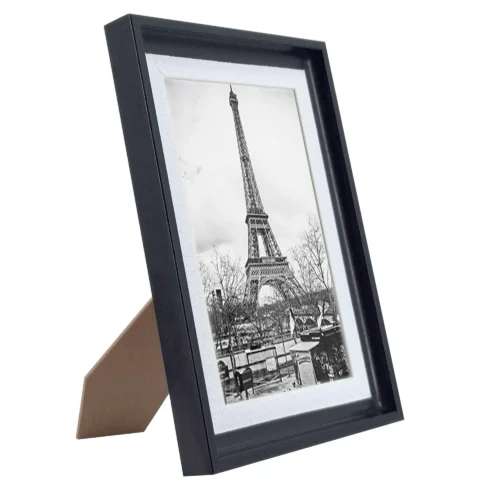 Photo frame with real glass, PVC frame, slightly textured white inner border, and black outer border, suitable for 4x6 or 5x7 inch photos.