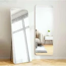 Full-Length Mirror Round Corner White 65x180cm standing against a wall, showcasing modern home decor.