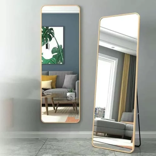 Full-Length Mirror Gold Round Corner 65x180cm standing against a wall, showcasing modern home decor.