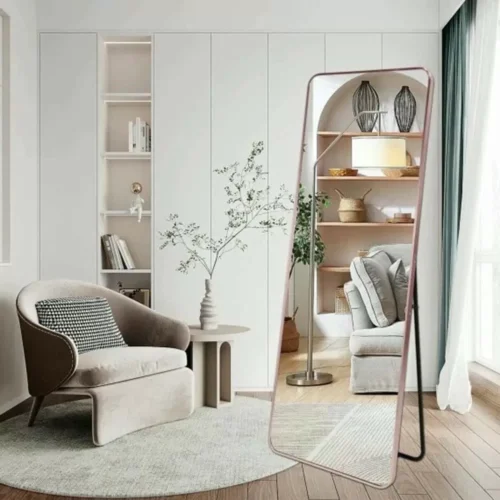 Full-Length Mirror Rose Gold Round Corner 65x180cm standing against a wall, showcasing modern home decor.