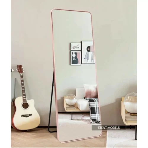 Full-Length Mirror Rose Gold Round Corner 65x180cm standing against a wall, showcasing modern home decor.