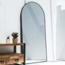 Black arch full-length mirror with aluminum alloy frame, ideal for bedroom and living room decor